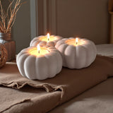 Detail of pumpkin texture on minimalist tealight holder for autumn decor