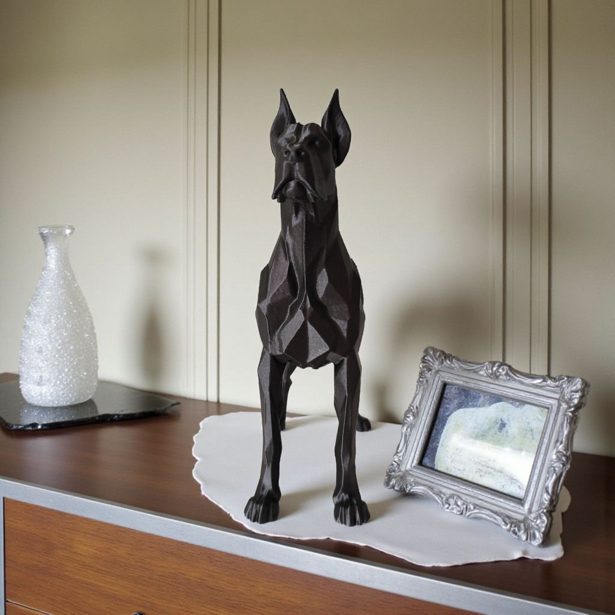 Low poly great dane sculpture showing geometric faceted surface and strong profile