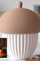 Close-up of ribbed acorn container showing texture detail and LED slot