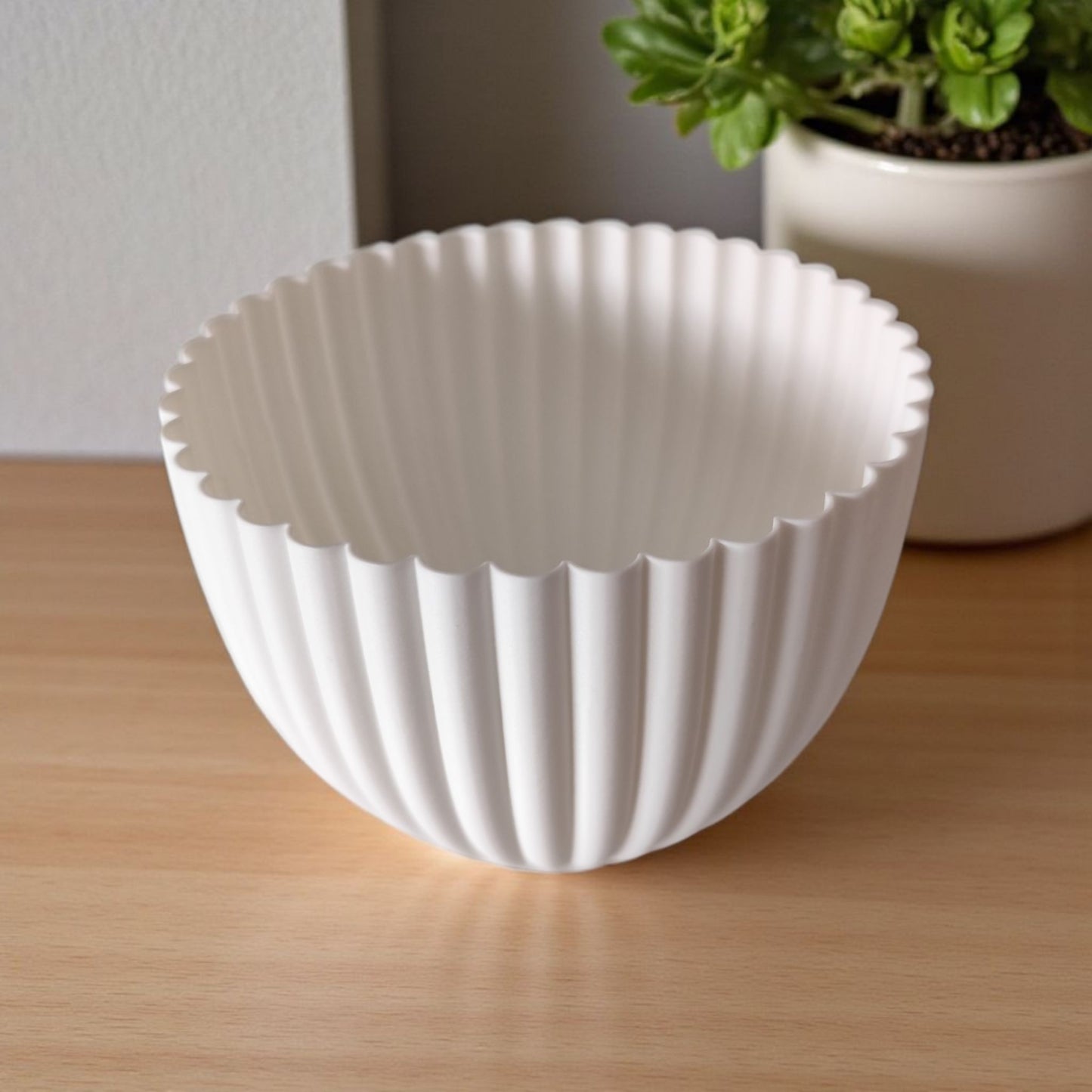 Close-up of ribbed acorn container showing texture detail and LED slot
