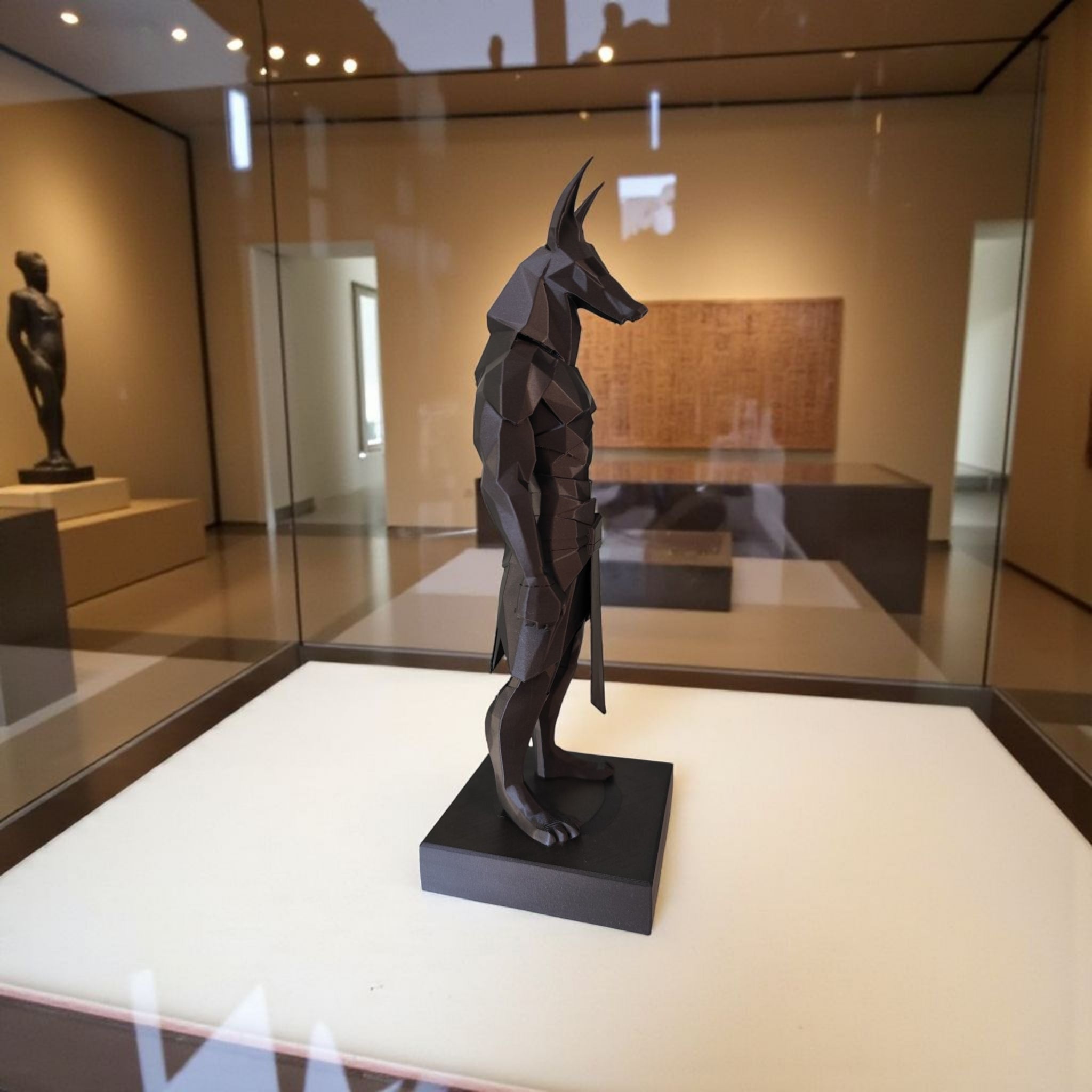 Detail view of anubis statue's textured polygonal surface catching light