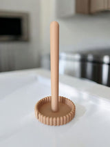 Minimalist paper towel holder with smooth bars and rounded base