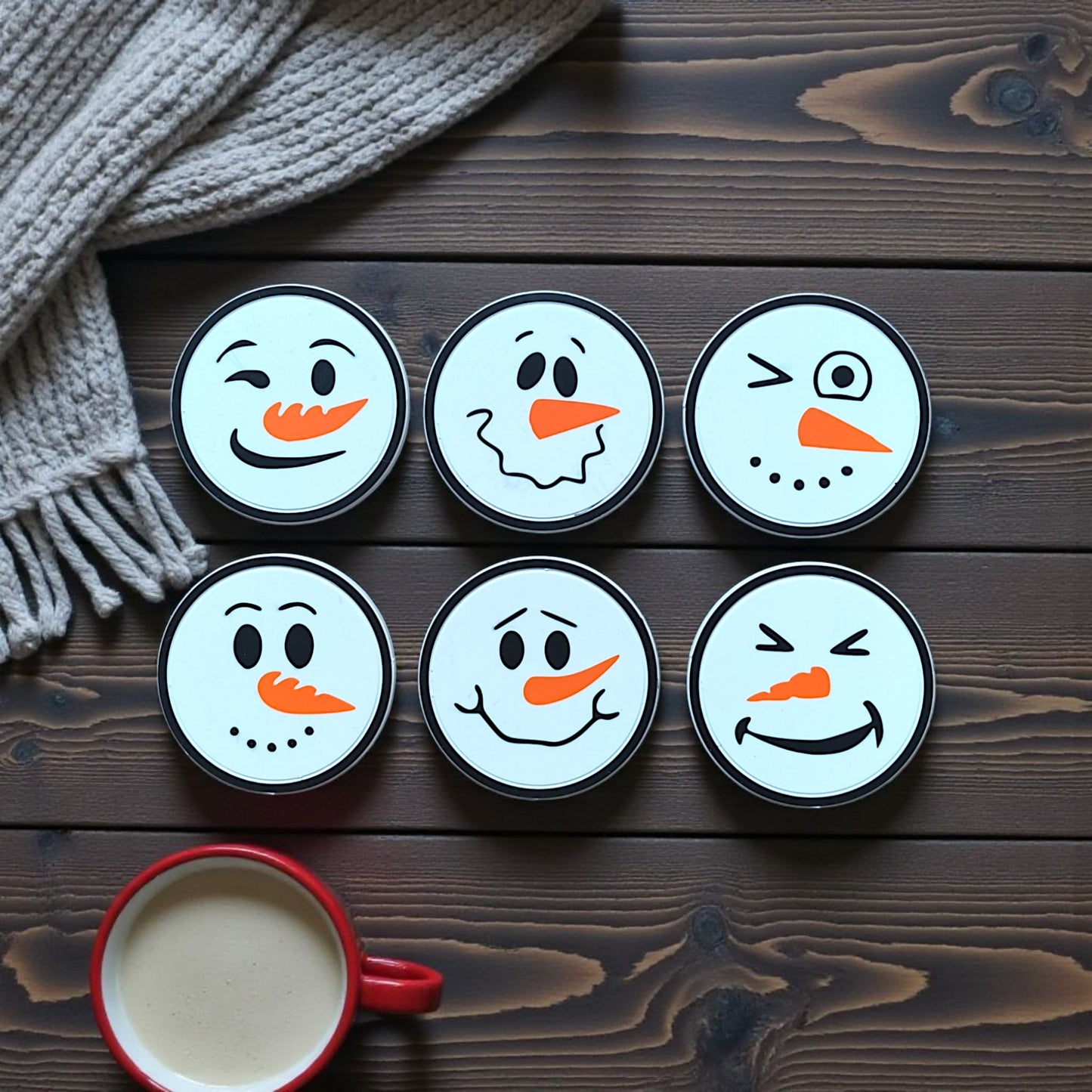 Snowman coasters with holder styled on a winter table setting
