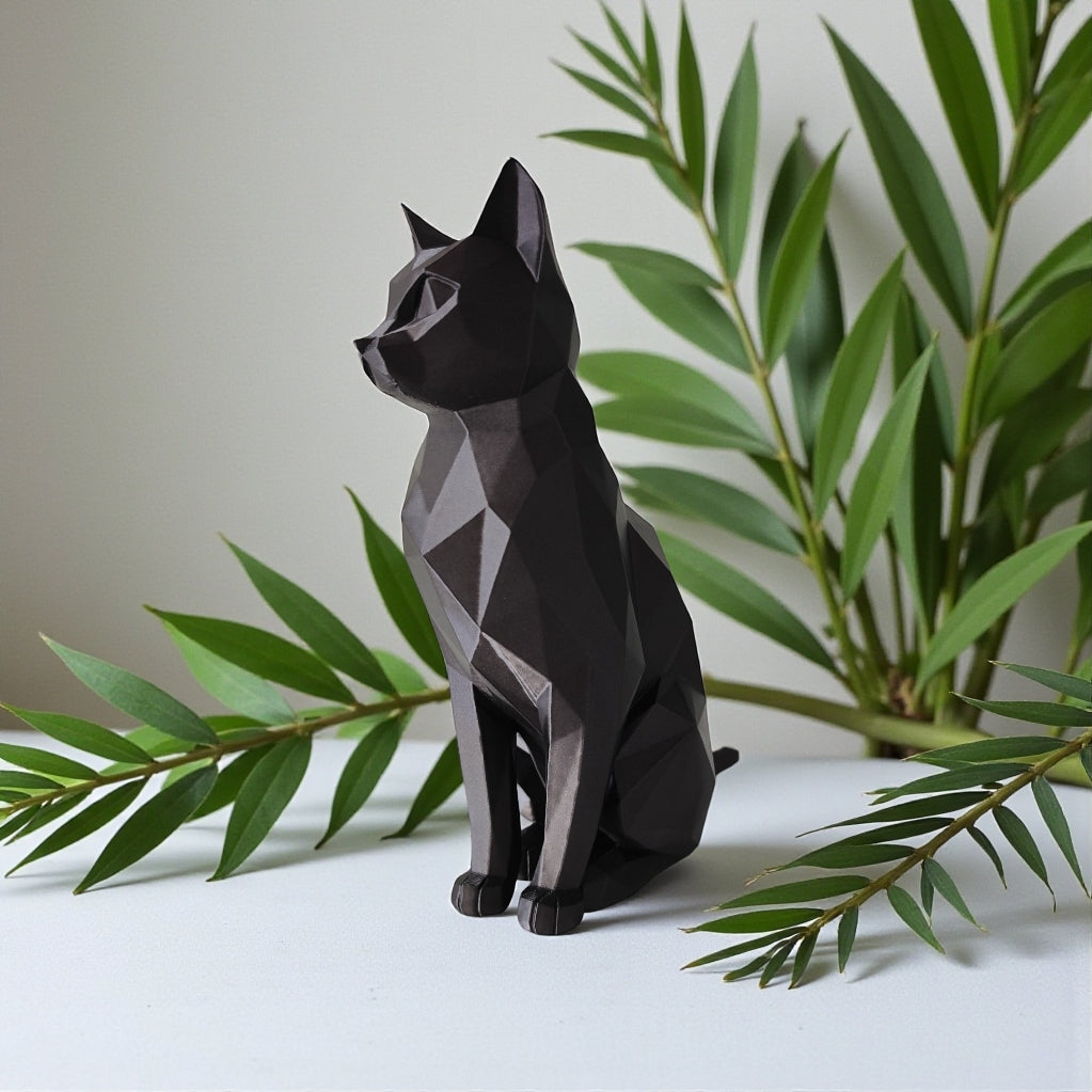 Close-up of low poly cat sculpture showing geometric facets and angles