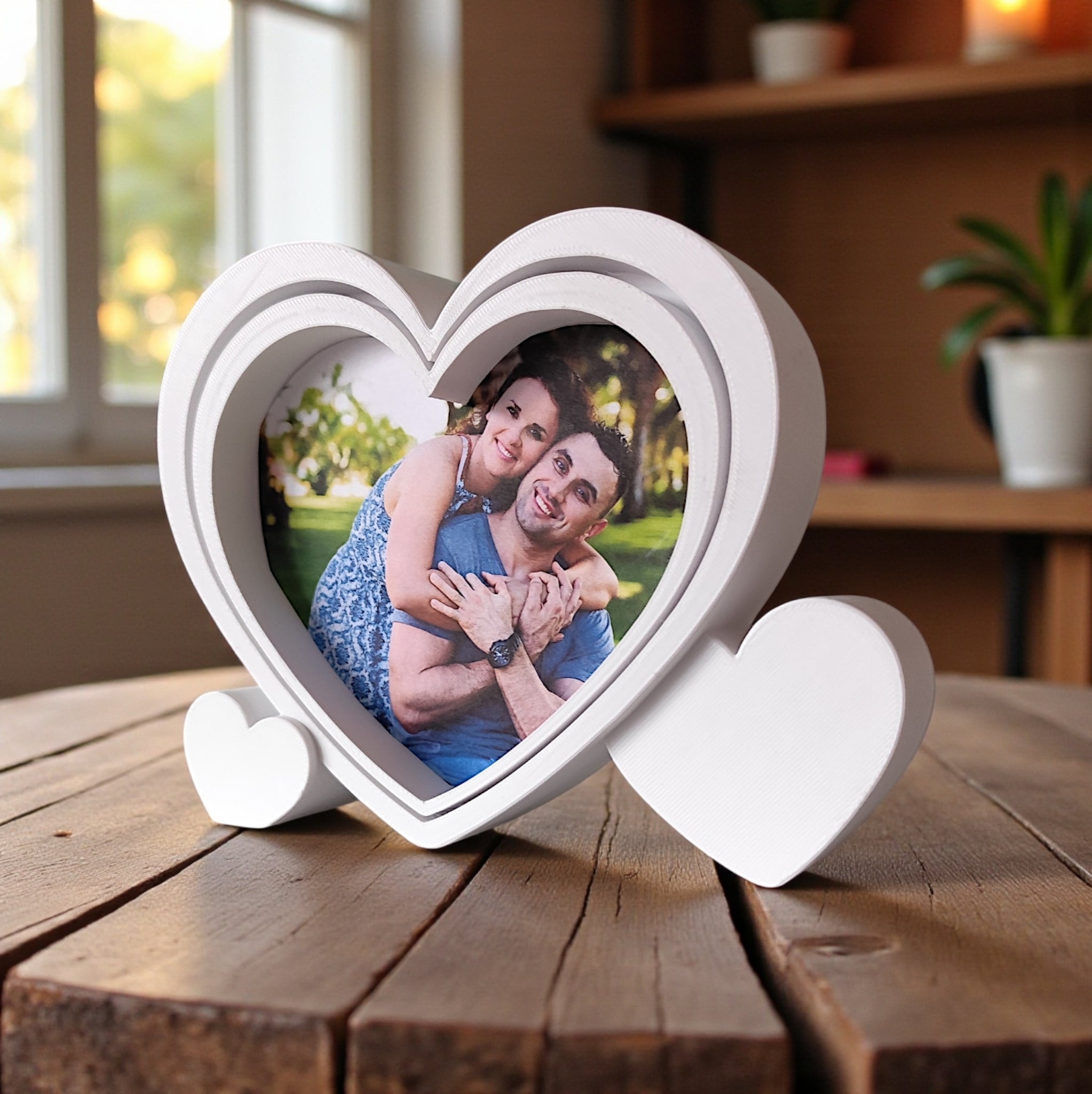 Detail of heart picture frame showing the delicate base and frame opening