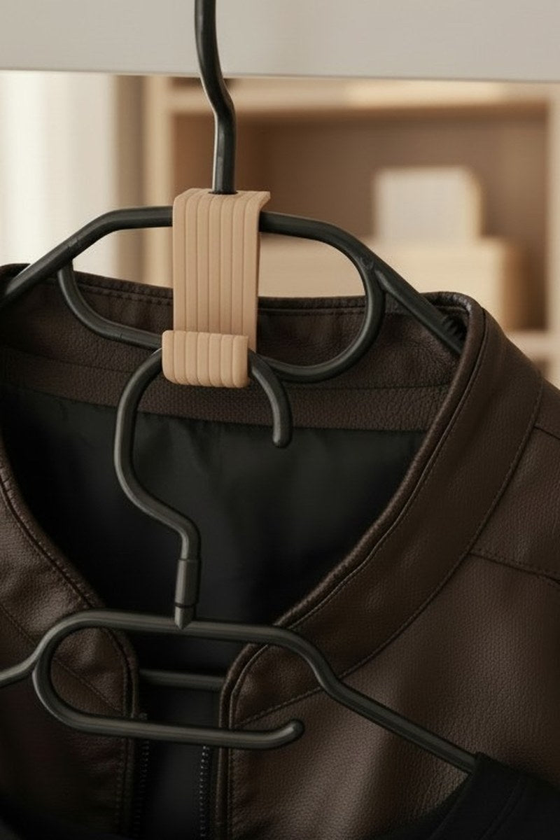 Clever clothes hanger hook connecting two wooden hangers