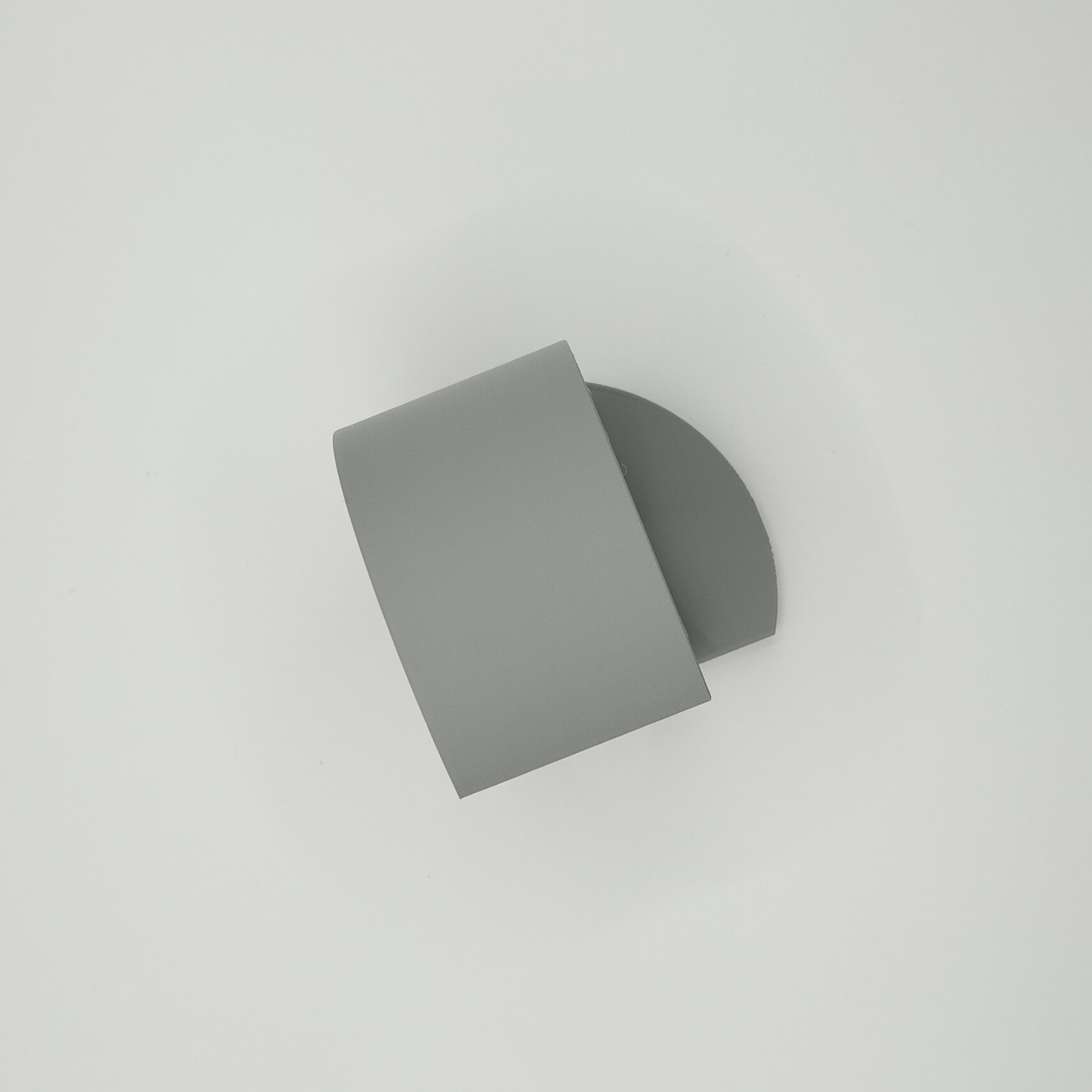 Close-up of smooth circular bookend profile showing clean edges