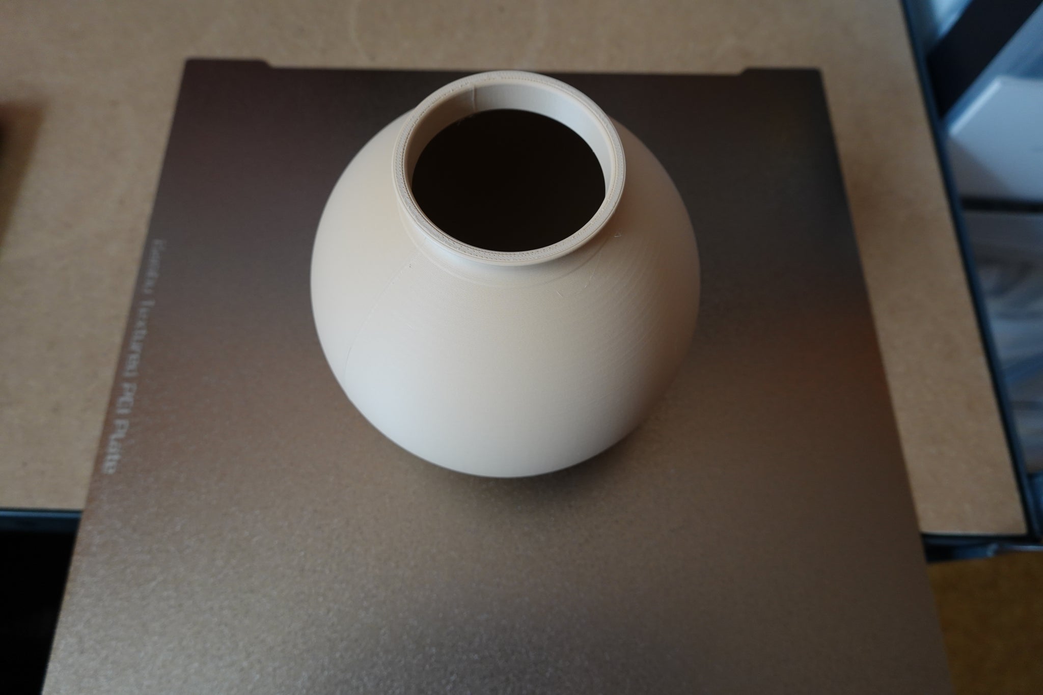 Detail of vase surface texture with soft light reflection on ceramic-like finish
