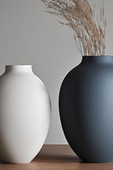 Close-up of modern amphora vase showing smooth curves and tapered neck