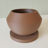 Close-up of modern bonsai pot showing clean rim and subtle curves