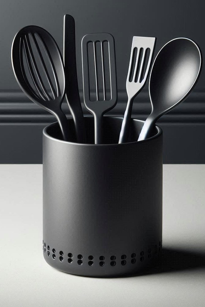 Minimalist kitchen utensil holder in matte finish, front-facing close-up