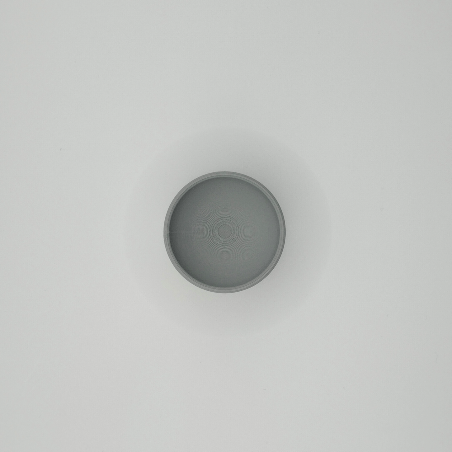 Detail of egg cup rim and smooth surface texture from above