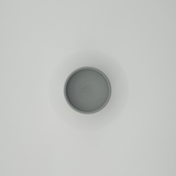 Detail of egg cup rim and smooth surface texture from above