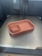 Minimalist key tray with integrated coin bowl, aerial view showing compartments