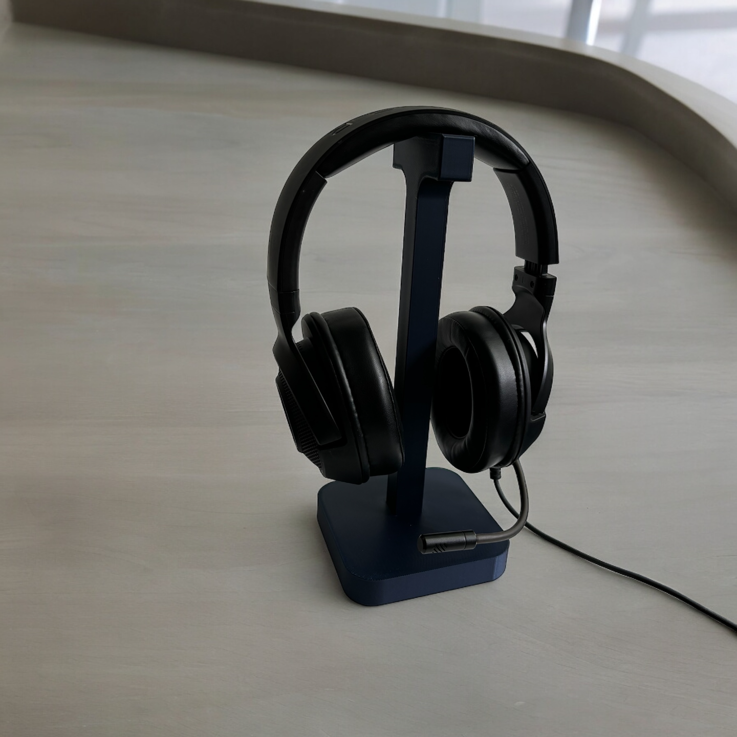 Detail of smooth curved surface and stable base of the headphone stand