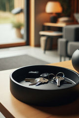 Round key tray in profile, showing shallow dish form and clean edge