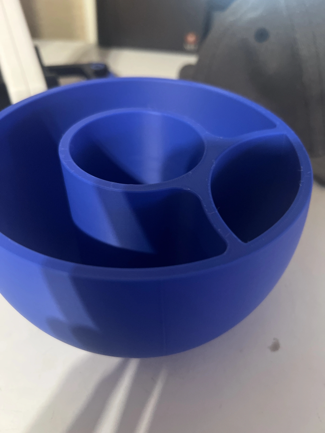 Interior view of self-watering planter reservoir chamber and water distribution holes