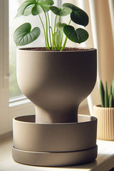 Self-watering planter with grail design, close-up view of elegant silhouette