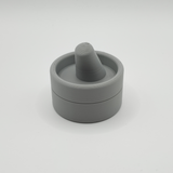 Ring holder displayed on a dresser with jewelry and home accessories