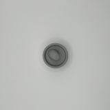 Close-up of ring holder surface showing refined sculptural detail