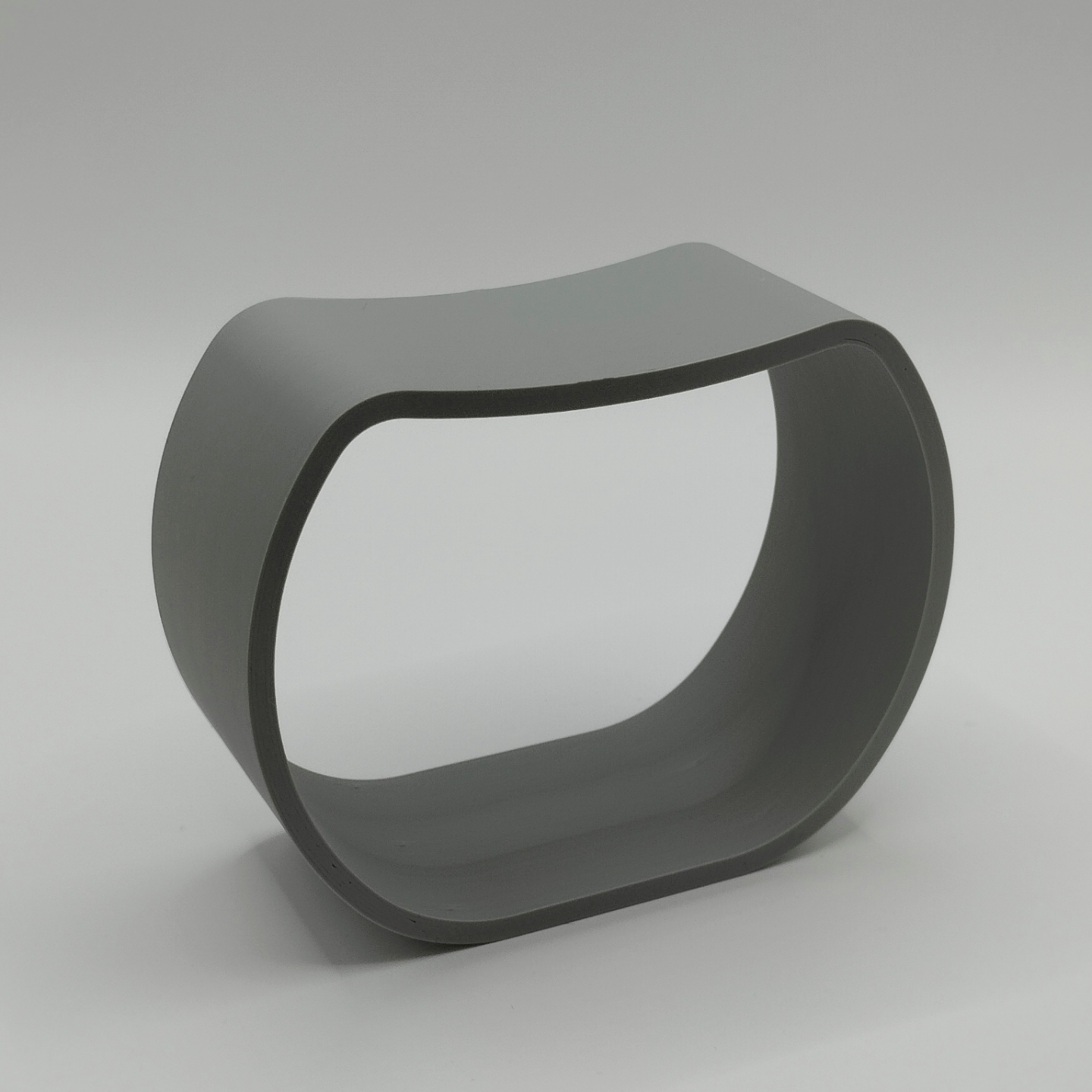 Minimalist necklace holder displayed on a white bedroom dresser with pendant jewelry