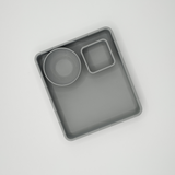 Close detail of smooth bowl surface of modern remote caddy