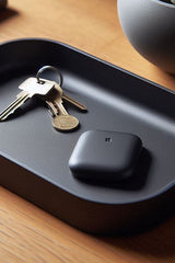 Minimalist rectangular key tray with curved edges and rounded corners, top view