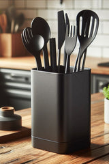 Square kitchen utensil holder with wooden cooking spoons, close-up view