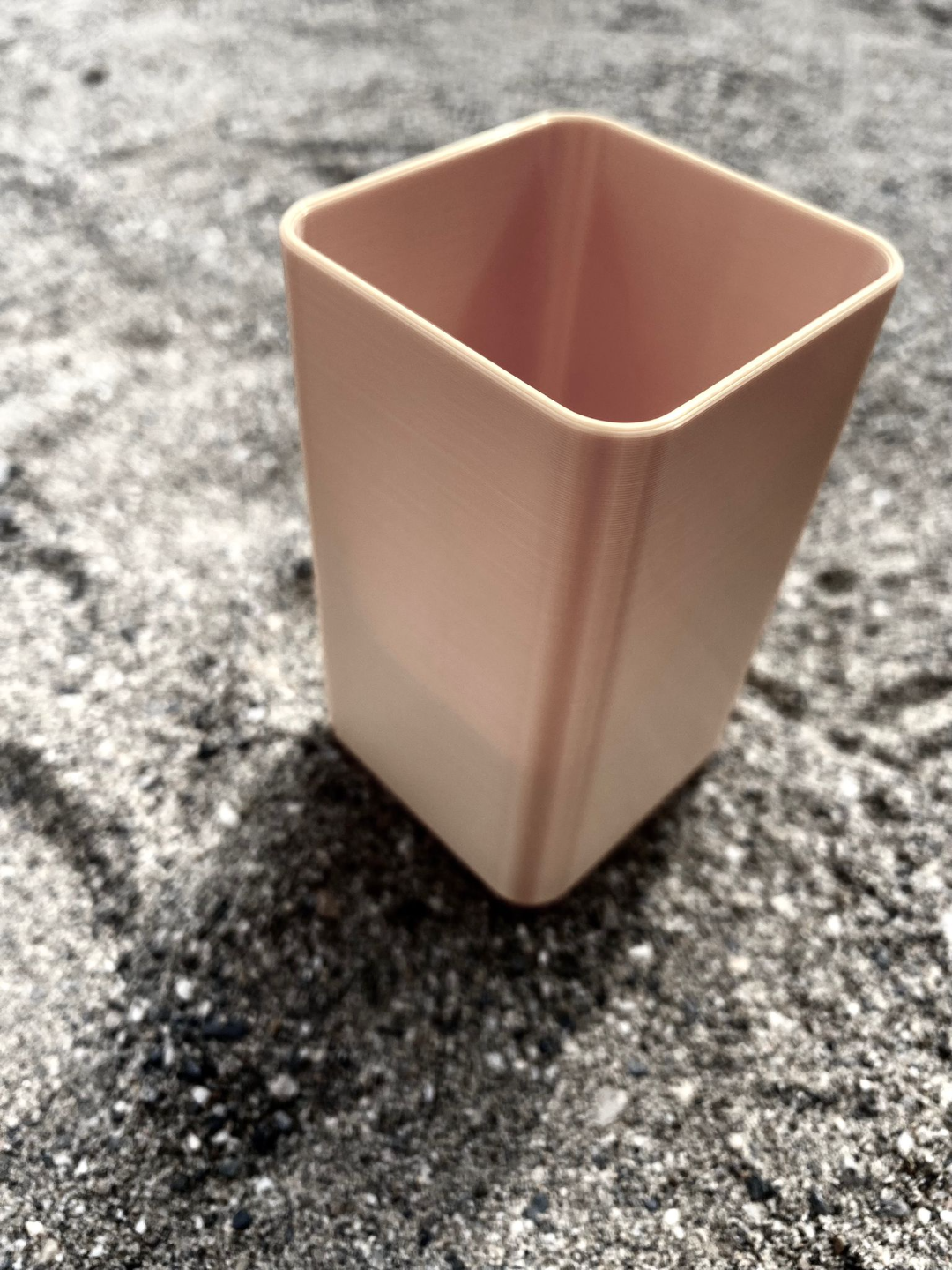Minimalist square holder on kitchen counter with cooking tools and utensils