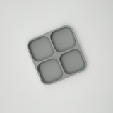 Close-up detail of the thin-walled compartment dividers of the key tray