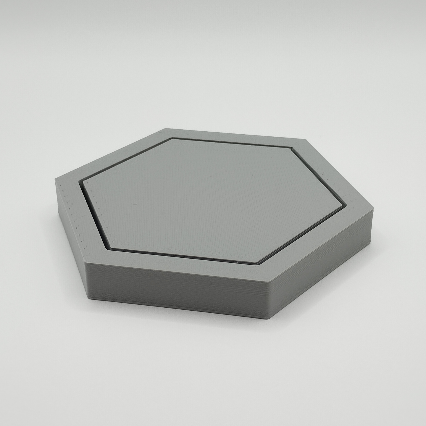 Hexagonal coaster placed on wooden table with coffee cup, minimalist table setting