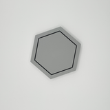 Close-up detail of hexagonal coaster edge, showing clean geometry and finish