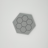 Close-up detail of hexagonal coaster edge and flat surface texture