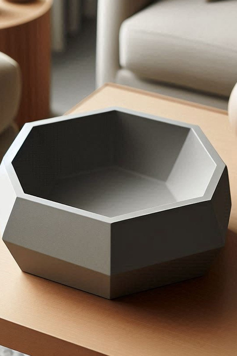 Close-up of minimalist bowl showing smooth curved form and matte surface