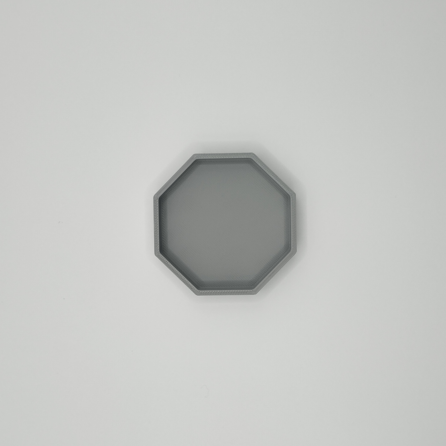 Detail of octagonal tray showing refined surface and form