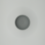 Detail of the smooth curved lip and stem of the minimalist egg cup
