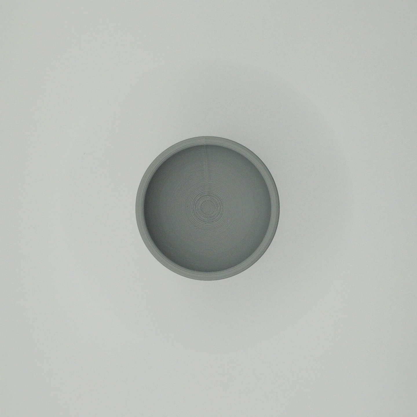 Detail of the smooth curved lip and stem of the minimalist egg cup