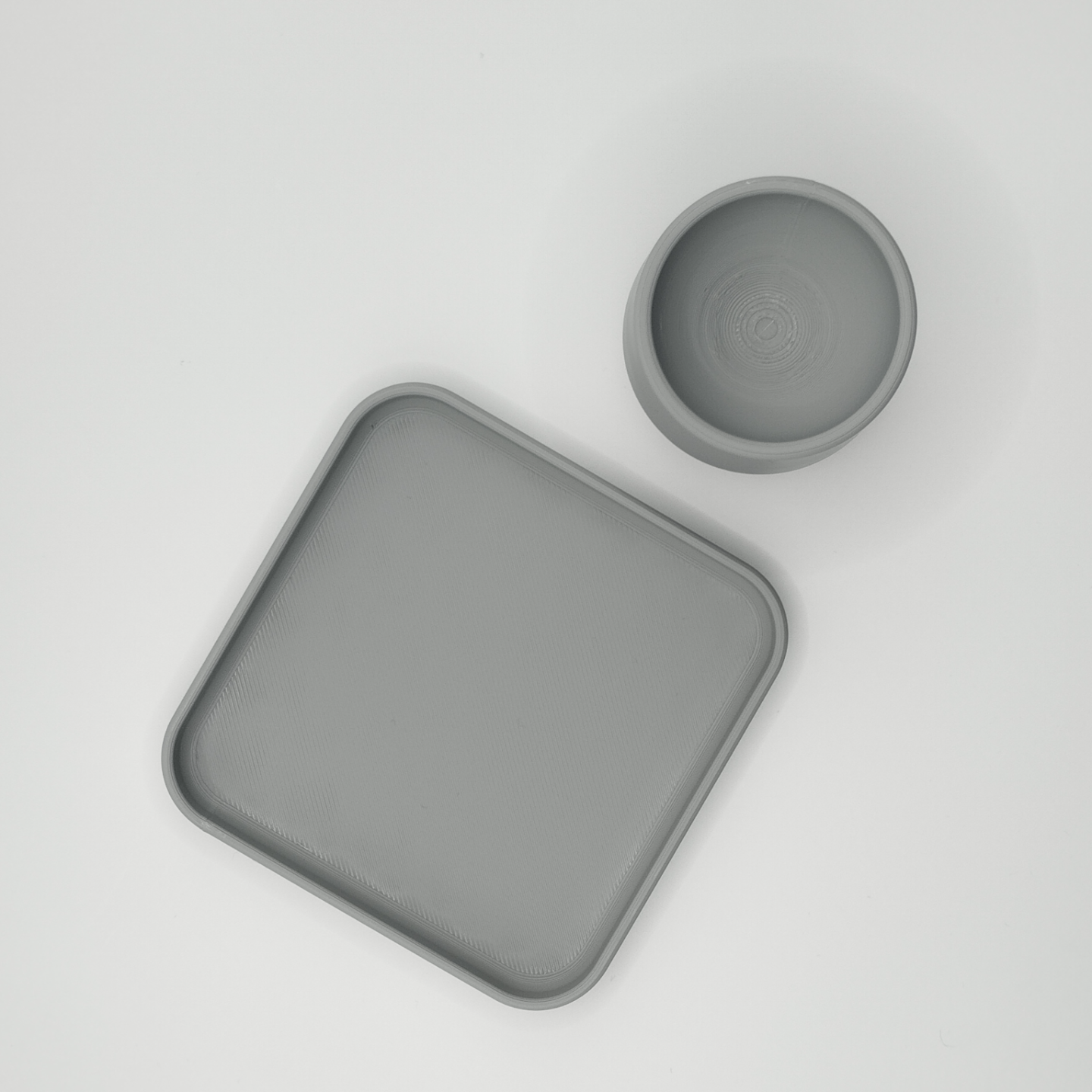 Detail of egg cup rim and coaster base, geometric design