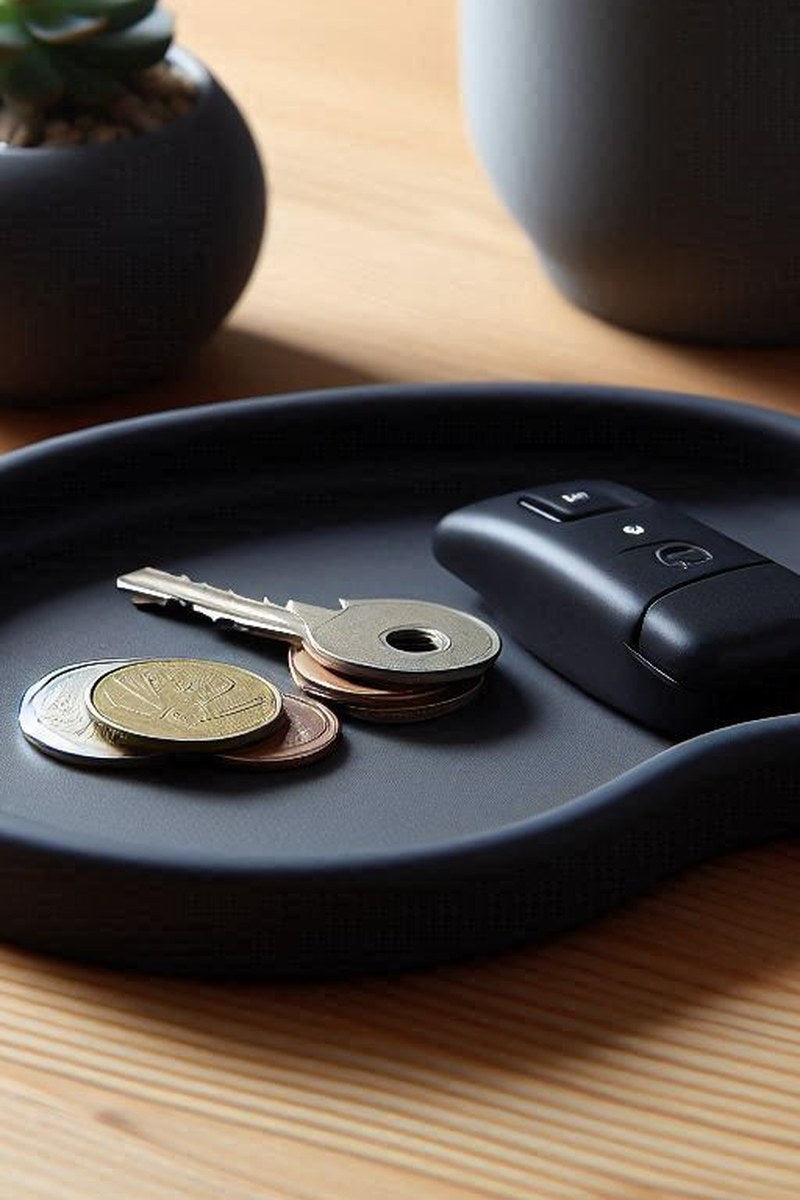 Close-up of kidney flush key tray showing organic curved form and smooth surface