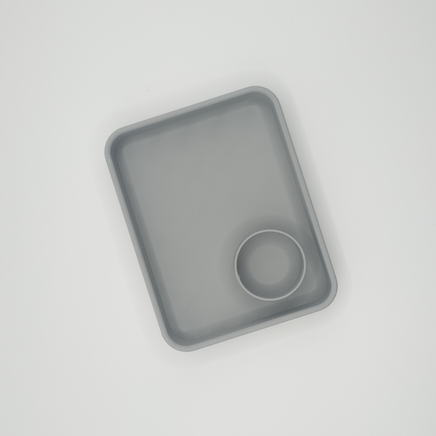 Close-up detail of the clean edge and divided sections of the key tray
