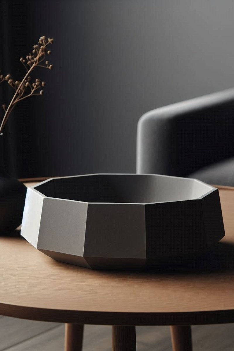 Close-up of a minimalist bowl with sharp geometric lines and smooth surface