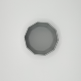 Detail of the sharp, clean edge and refined surface texture of the bowl
