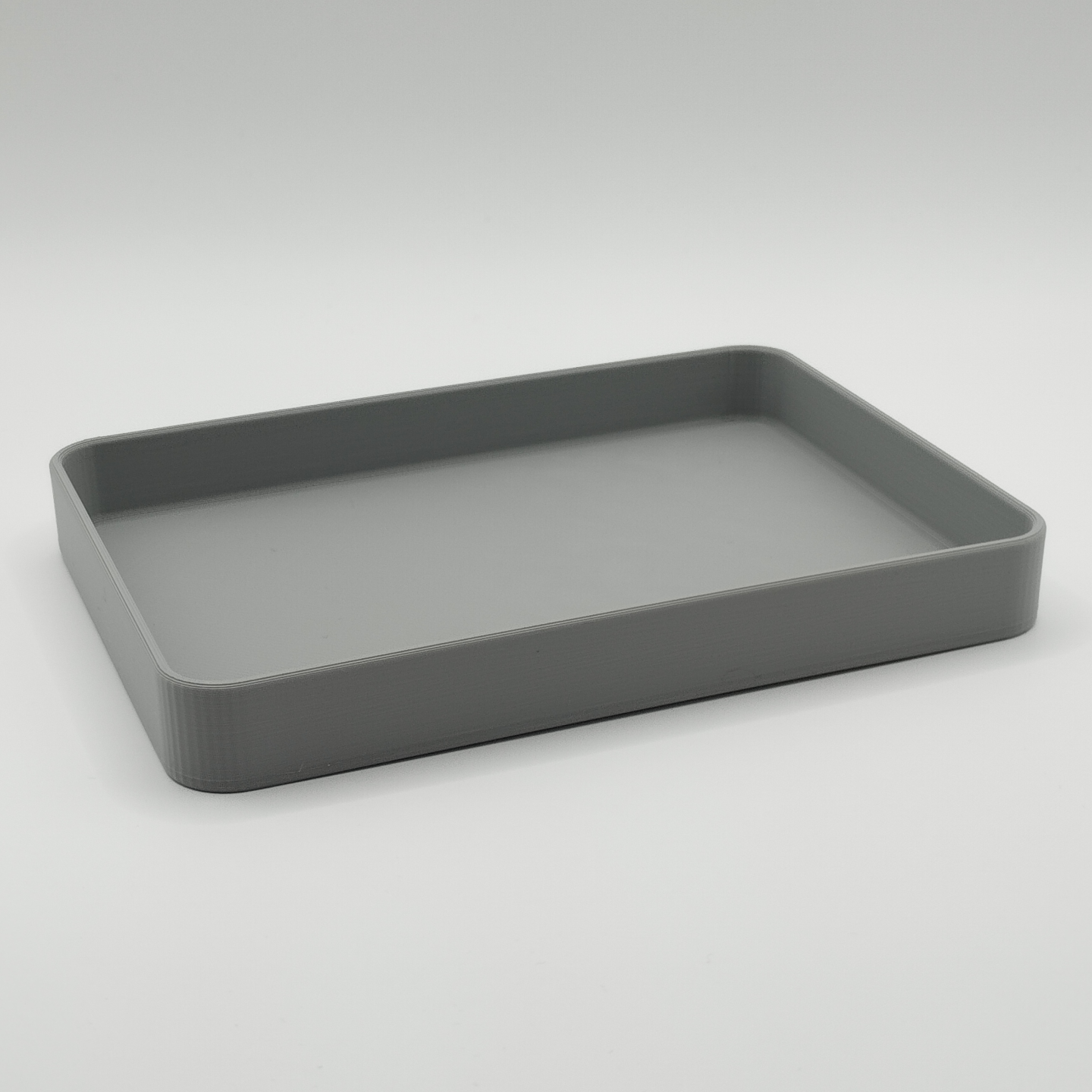 Big Business tray styled on entryway console with wallet and small items