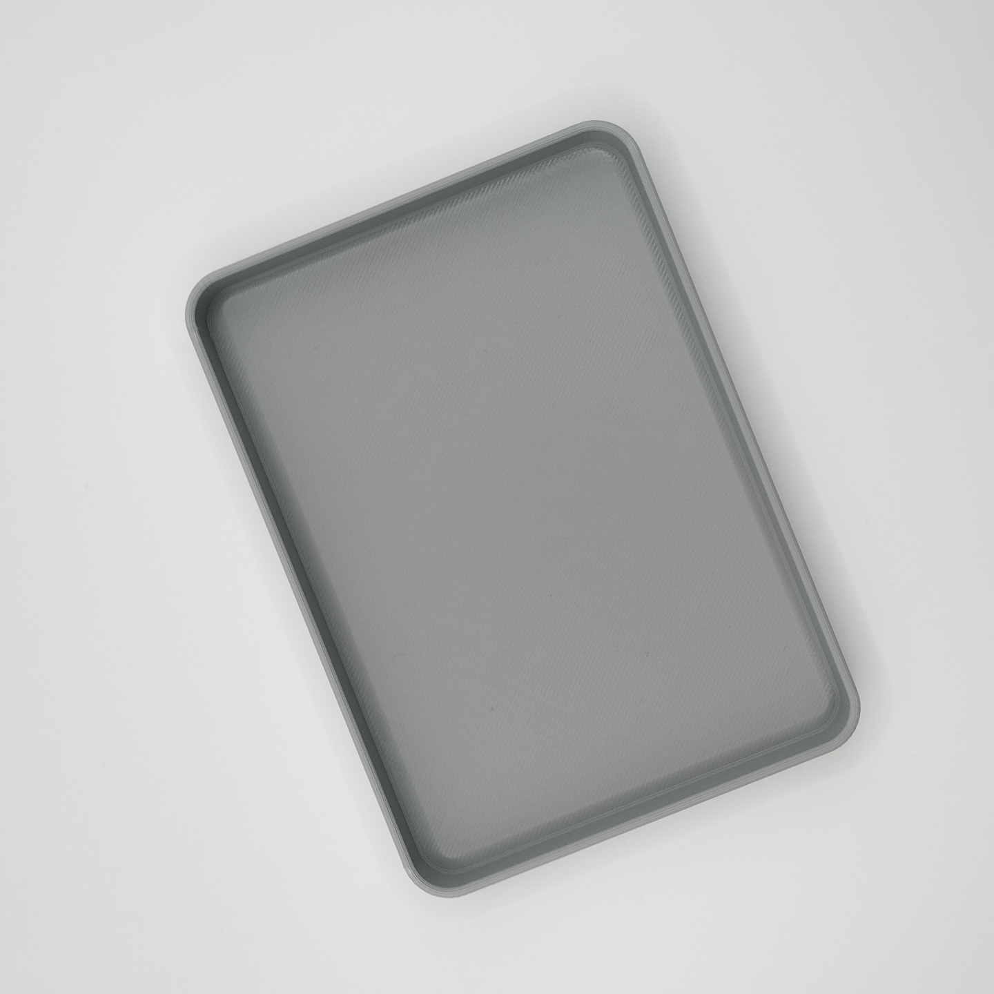 Close detail of clean-lined key tray surface and geometry
