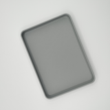 Close detail of clean-lined key tray surface and geometry