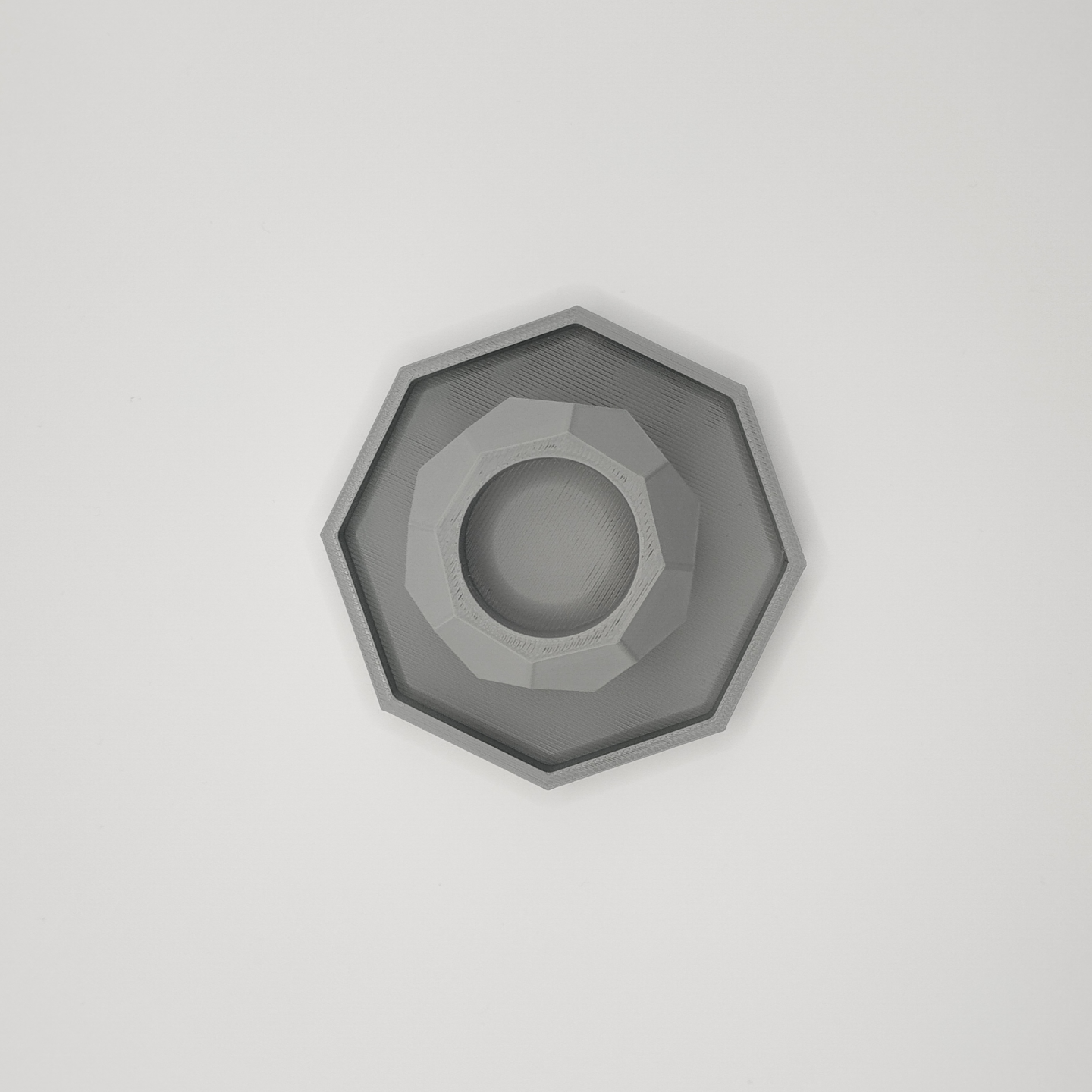 Detail view of octagonal geometry and coaster base
