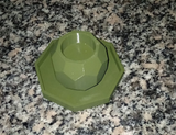 Close-up of octagonal candle holder from above with tea light