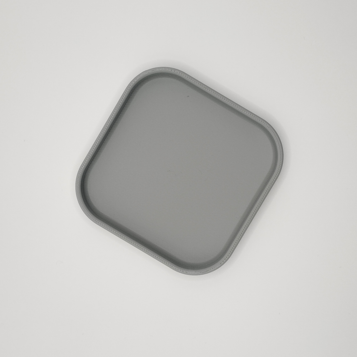 Square key and phone tray in white, top view showing flat surface
