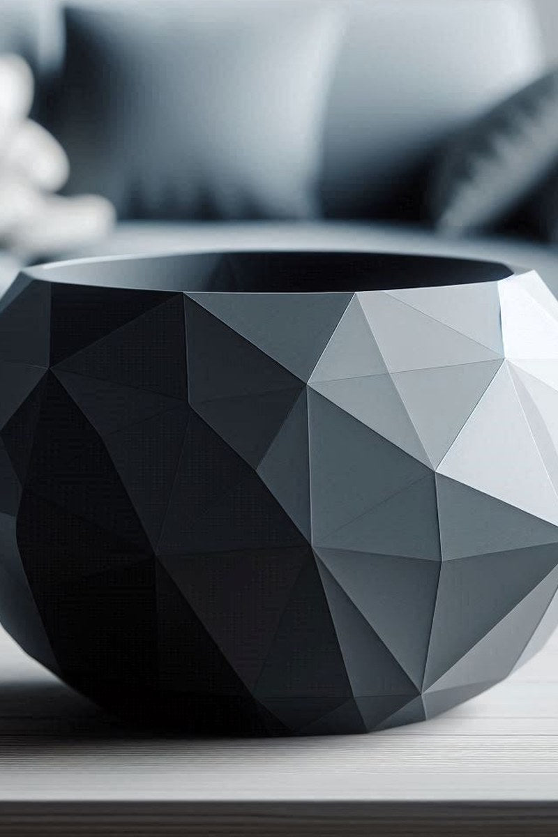 Close-up of low poly bowl showing cracked stone-inspired geometric facets and subtle shadow play