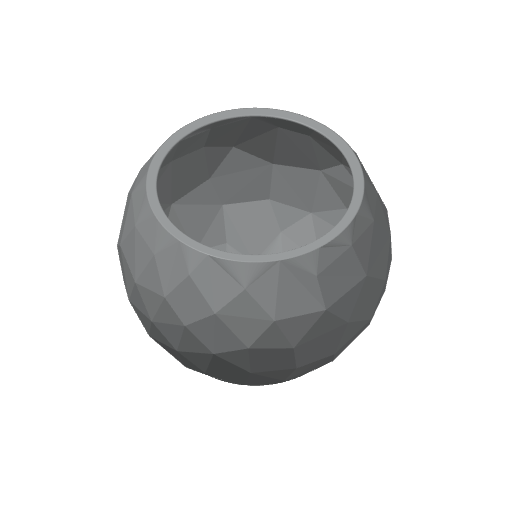 Close-up of low poly bowl showing cracked stone-inspired geometric facets and subtle shadow play